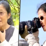 Chinese wildlife photographer Wang Ying photographing penguins in Antarctica after a thyroid cancer diagnosis.