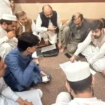 Relief cheques distributed among families affected by the Peshawar school tragedy.