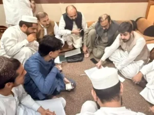 Relief cheques distributed among families affected by the Peshawar school tragedy.