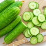 Crushed cucumber pieces prepared for a healthy, low-calorie salad.