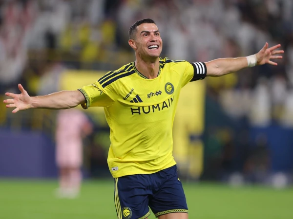 Cristiano Ronaldo celebrates scoring for Al Nassr against Al Kholood.