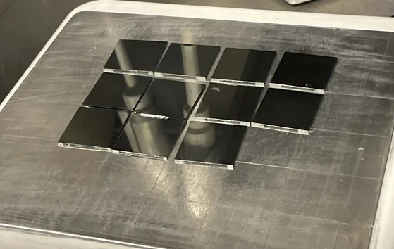 Scientists developed a new method to improve solar cell efficiency and lifespan by creating larger and more uniform perovskite crystals.