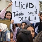 Students and parents protest restrictions on hijab in Azerbaijani schools.